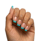 Blue French Tips press-on nails with sheer nude base and turquoise blue French tips in square shape, medium length, glossy finish, shown on hand.