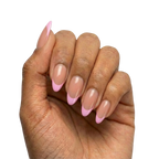 Lilac French Tips press-on nails with sheer nude base and lilac French tips in almond or round almond shape, medium length, glossy finish, shown on hand
